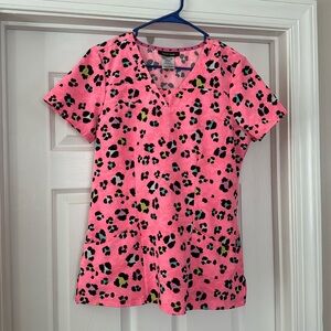 Women’s brightly colored scrub top